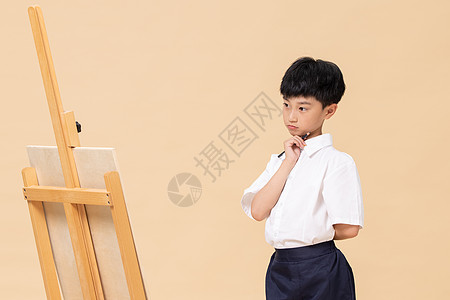 学习绘画遇到瓶颈的小男孩图片