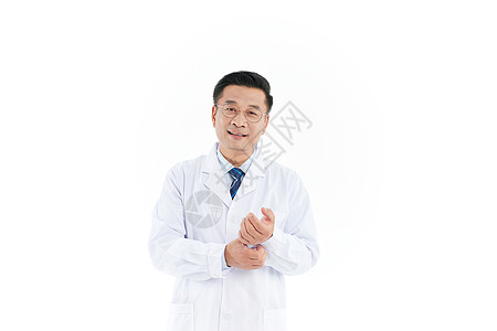 中年医生整理衣袖图片