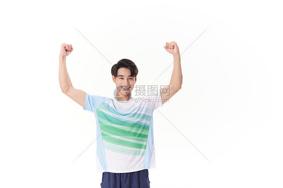 运动员高举双手欢呼胜利图片