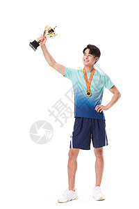 高举奖杯的运动员背景图片