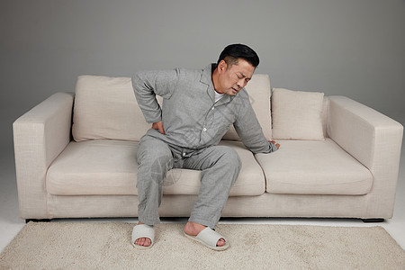 腰痛的中年男人图片 腰痛的中年男人素材 腰痛的中年男人高清图片 摄图网图片下载