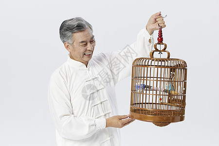 中老年男性手提鸟笼图片