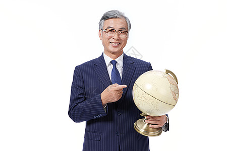 男性企业家老板拿地球仪图片