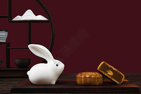 中秋兔子中秋节月饼和玉兔背景