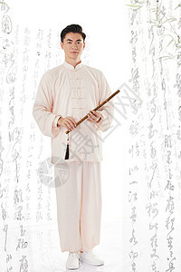 中国风男性手持笛子背景图片