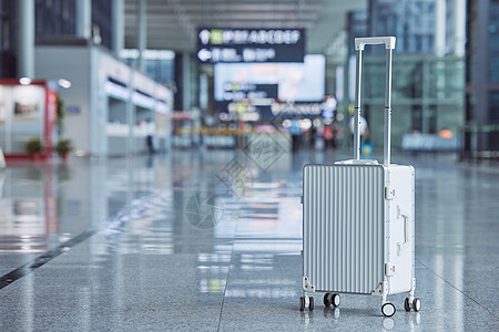 中国护照机场的行李箱静物背景