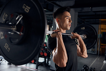 运动用品举重锻炼男性肌肉拉伸背景
