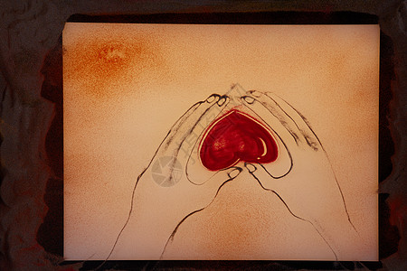 红色手绘爱心手绘沙画双手托爱心背景