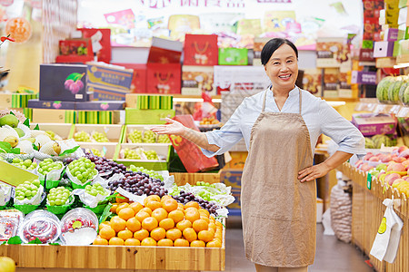 水果商店水果店店员中年女性形象背景