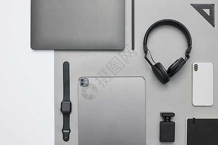 彩色铅笔背景灰色里的电子产品背景
