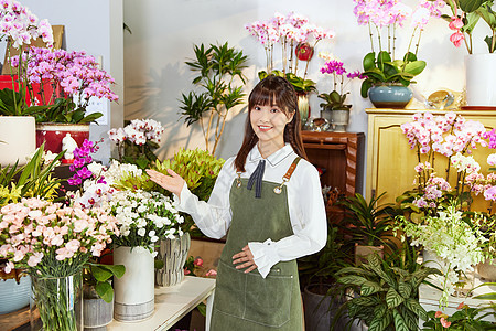 鲜花店美女销售服务员背景图片