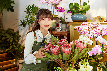 鲜花店美女销售员形象背景图片
