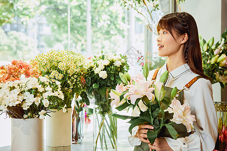 花艺店美女服务员鲜花销售图片