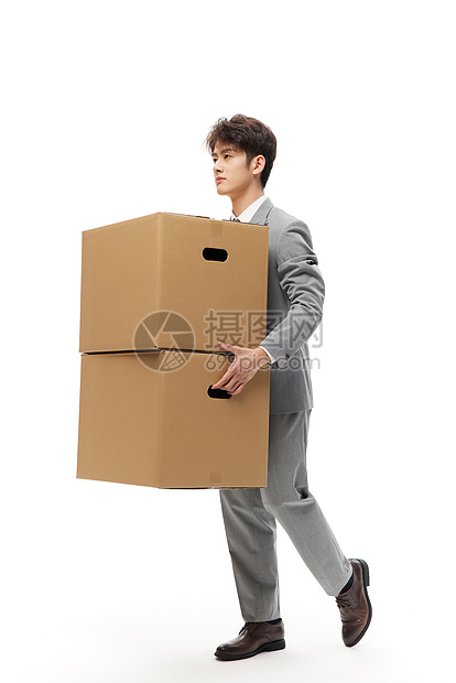 失业商务男性整理个人物品纸盒箱图片