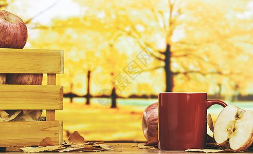 奶茶师秋天氛围下的热饮和苹果背景