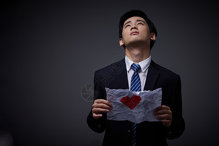 失恋的商务男性背景图片