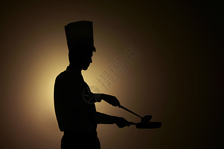 厨师炒菜剪影形象图片
