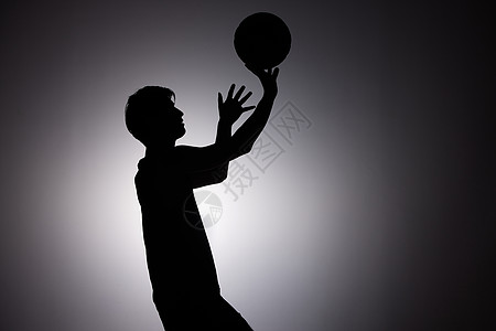 男性篮球运动员剪影形象图片