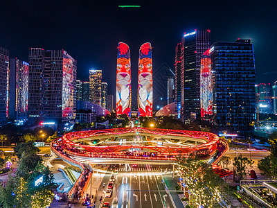 新与旧航拍成都新地标交子之环与金融城双子塔夜景背景