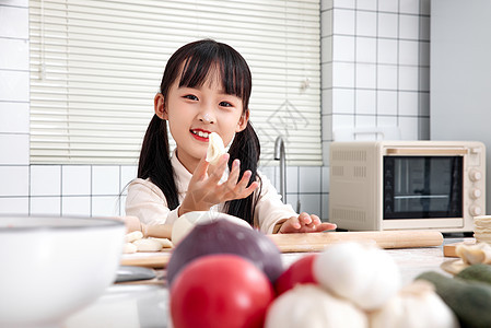 孩子学包水饺背景图片