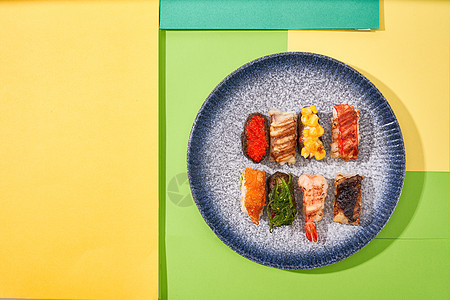 创意撞色多彩寿司背景图片