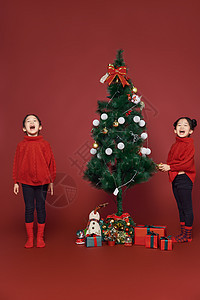双胞胎小女孩过圣诞节背景图片