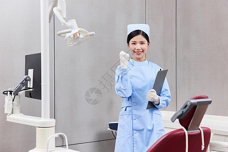 牙科诊所女护士加油手势图片