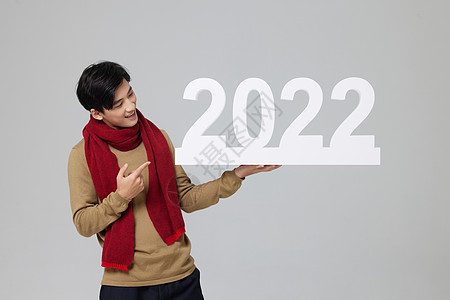 春节喜庆男性手托着2022图片