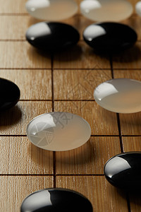 围棋盘上的黑白棋子图片