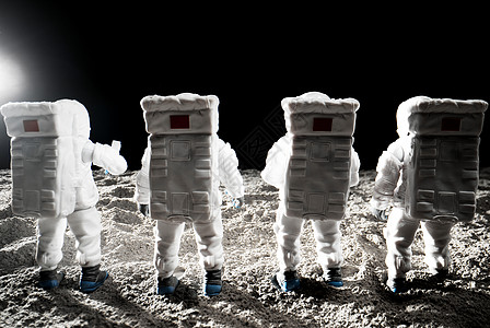 宇宙天梯站在月球表面的宇航员的背影背景