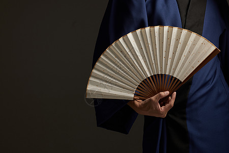 中国风纹理穿着汉服的人拿着折扇背景