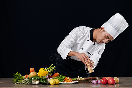 男性厨师形象装饰食材的厨师形象背景