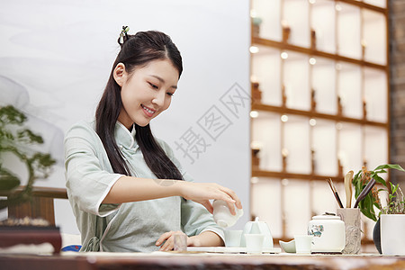 中国风女泡茶的女茶艺师背景