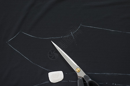 黑纺织粉笔中概述的服装制造商模式图片