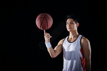 打篮球的男性运动员背景图片