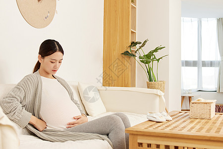怀孕女性居家形象背景图片