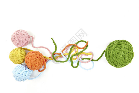 彩色毛球抱枕彩色缠绕杂乱的毛线球背景