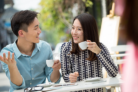 人休闲活动清新青年情侣坐在咖啡馆里图片