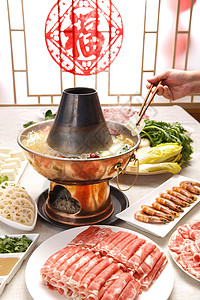 中国特色金属火锅与食材背景