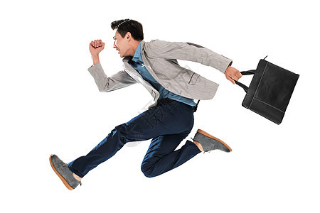 拿手提包奔跑的青年商务男士背景图片