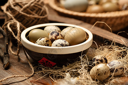 树枝上的福字碗盛鹌鹑蛋鸡蛋背景
