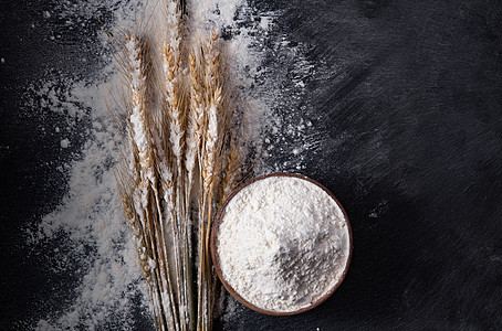 农作物杂粮传统一碗面粉和麦穗图片