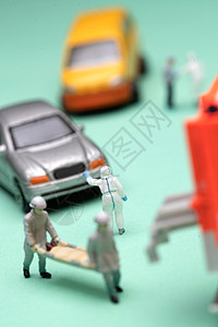 黄色汽车玩具紧急救援医务工作者禁止后方汽车通行背景