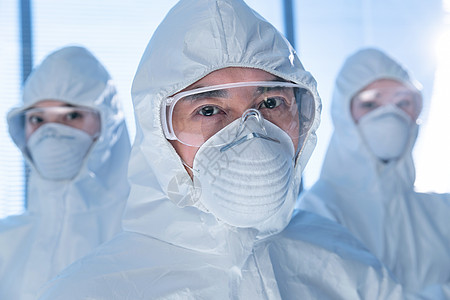 戴口罩穿防护服的医疗团队图片素材