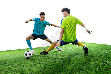 运动场草地挑战两名足球运动员踢球图片