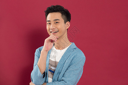 红色西服青年人亚洲兴奋自信的青年男人背景