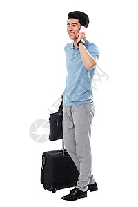 享乐衬衫领带拿行李箱的商务男士打电话背景