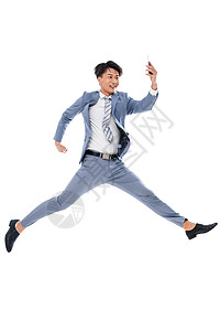 青年文化有趣的半空中拿着手机奔跑跳跃的商务男士图片