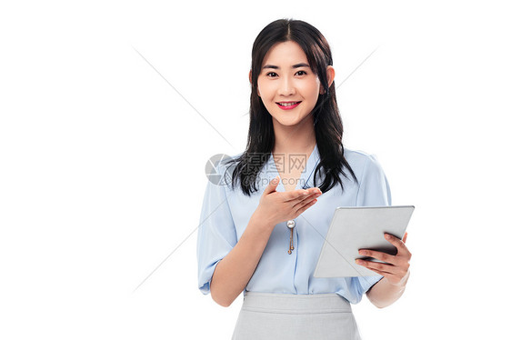 成功人士20多岁个拿平板电脑的商务女士图片