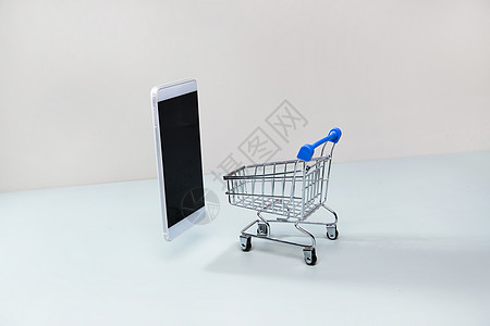 便捷现代网上购物手机和迷你购物车图片